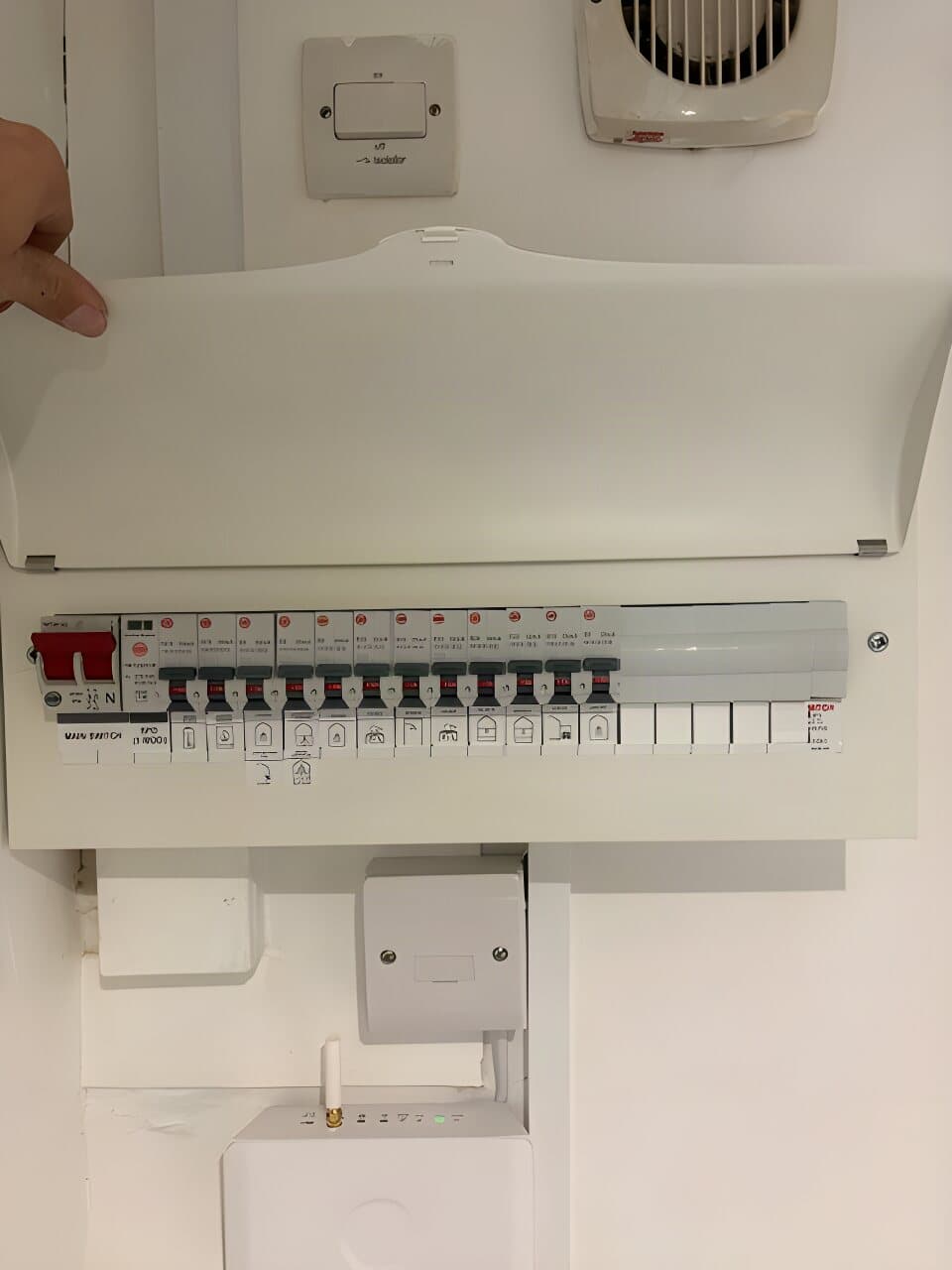 New consumer unit with the cover on and every circuit labelled